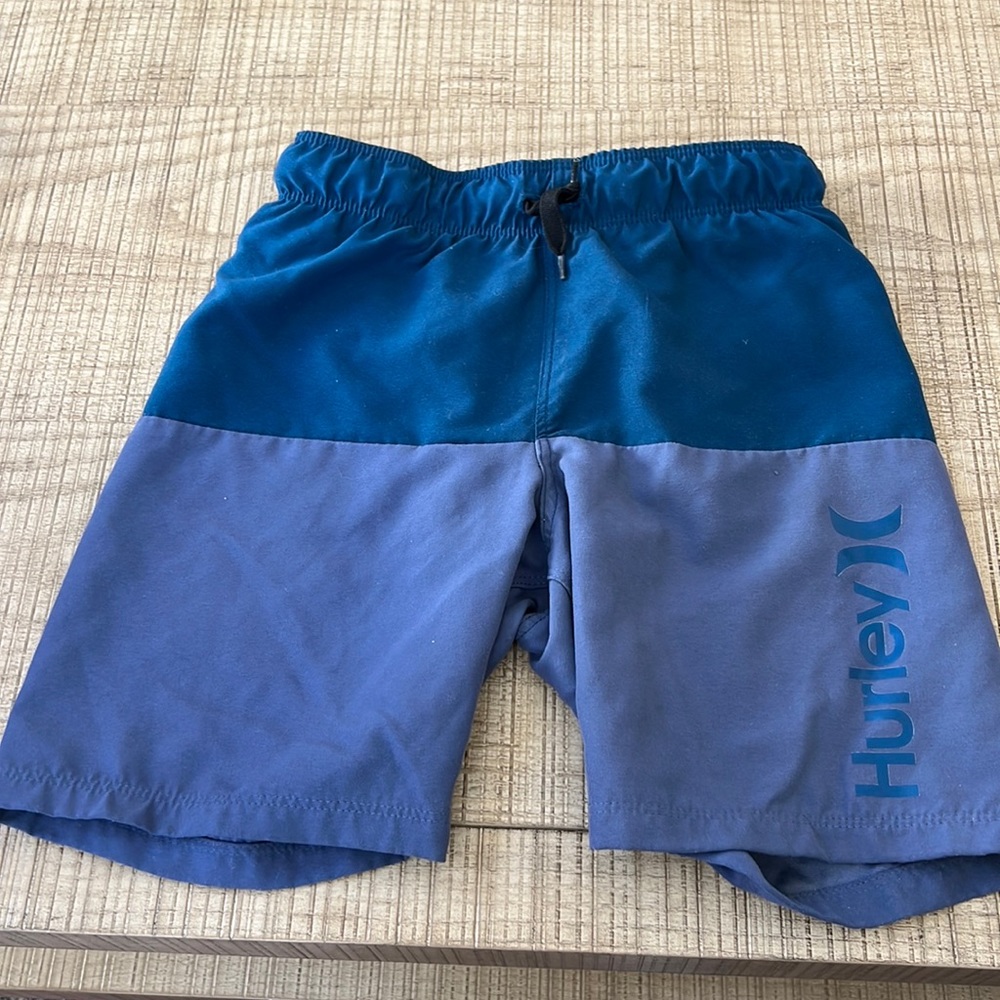 Gently worn boys gray and navy swim trunks